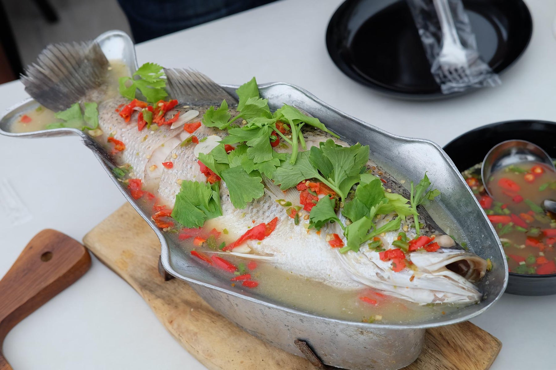 Steamed Fish Served with Chilli and Corriander